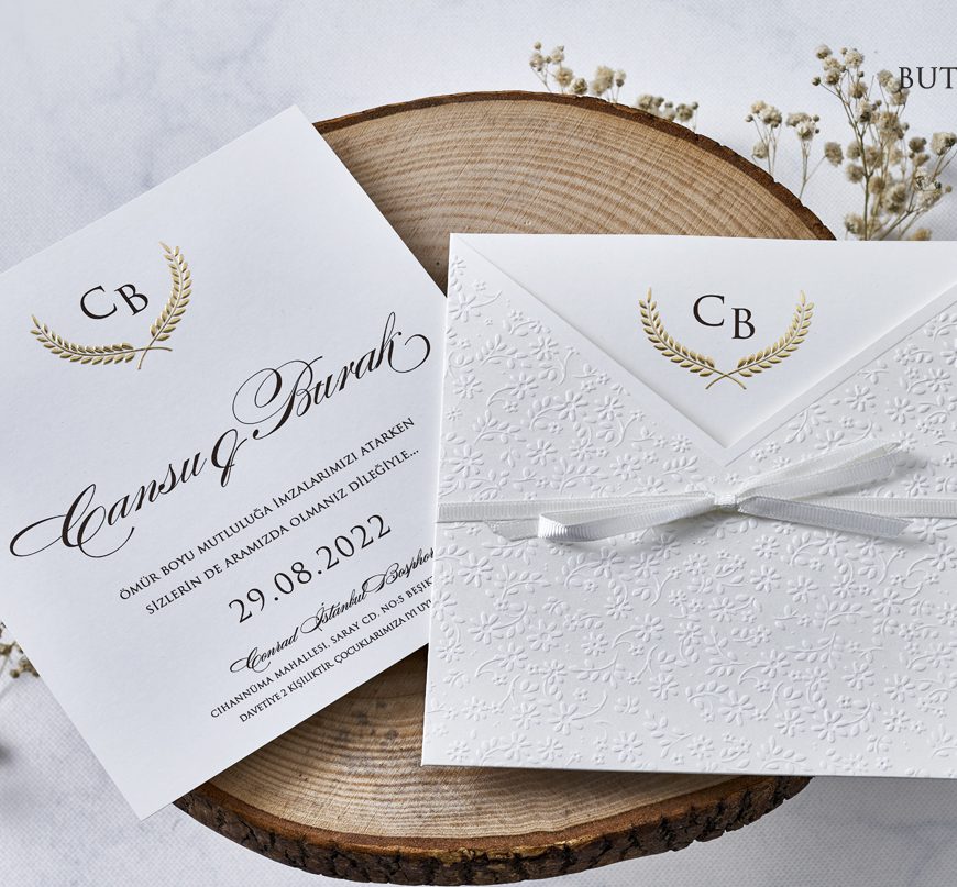 Faire part sobre blanc et doré avec noeud