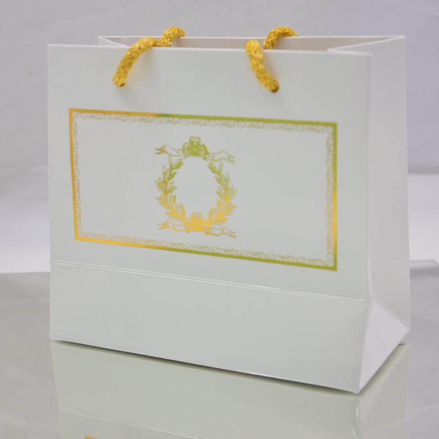 Sac blanc motifs doré